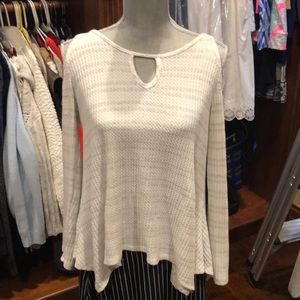 Cold shoulder knit top. Size small but runs large.
